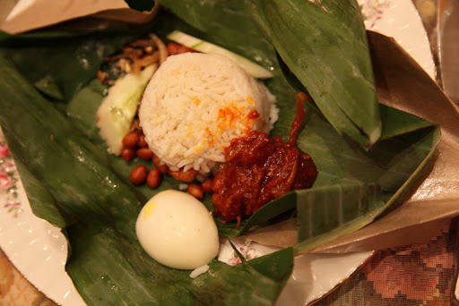 At brunch, we were served amazing foods! Sophie and I still talk about this dish called nasi lemak. When the banana leaf is opened, it serves as a plate for the condiments, all of which are colorful and delicious.