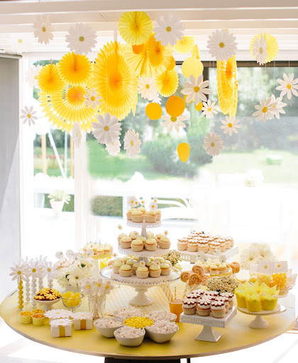 Similar flowers hung from the ceiling inside, where most of the cupcakes and other sweets were kept out of of the hot sun.