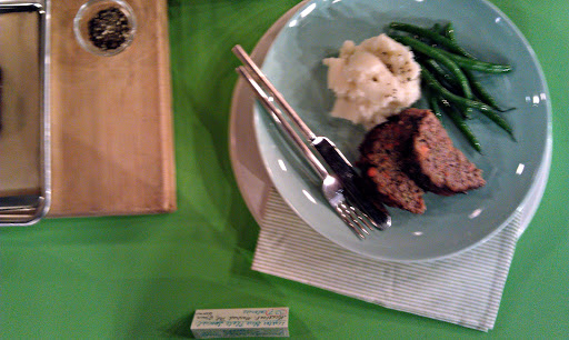 The meatloaf is served with low-fat buttermilk mashed potatoes and blanched olive oil-tossed green beans. This meal is just 327 calories per serving!