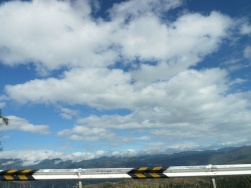 A guardrail along a mountain road