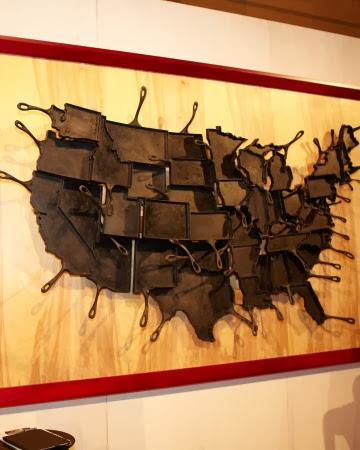 This map of the United States is a fantastic display of cast iron skillets in the shape of the states, forged by Wisconsin-based metal sculptor and American Made craft honoree Alisa Toninato.