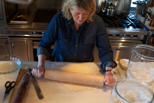 It's important to roll out the dough quickly, while it's still chilled. I also roll in one direction, turning the dough as I go.