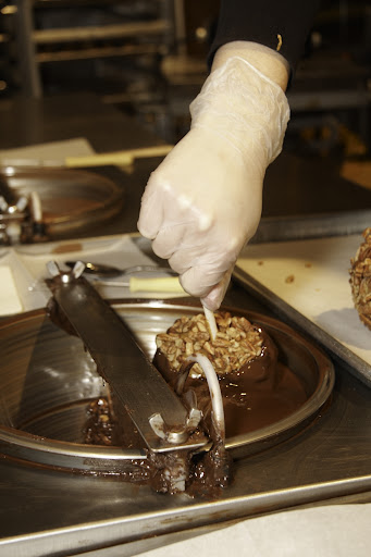 This apple gets a coating of dark chocolate.