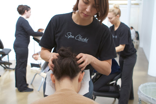 They offer a nice variety of massages, based on the customer's needs. This person is getting a relaxing head massage.