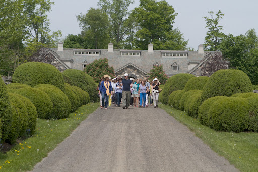 Walking through the allee - It takes about 2 months to build the bamboo frames around these shrubs for their winter burlap covers, but it's so, so worth the time and effort. These hedges are all pruned by hand, with pruners that are first sterilized in alcohol.