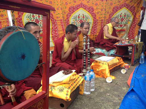 A very important tradition of our New Year's celebration is the praying for peace and prosperity, as these lamas are doing.