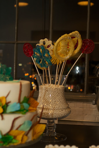 And these wonderful candy lollipops are as yummy as they are decorative. Darcy Miller has ordered them for special events in the past and loves them!
http://www.etsy.com/shop/andiespecialtysweets