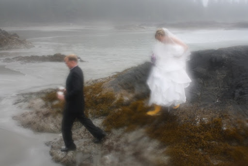 Coming off of the seaweed-covered rocks we were surprised to see that the bride was wearing bright yellow rain boots!
