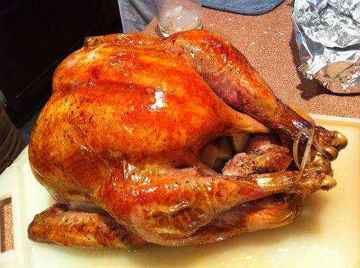 Sara Hopper - My brother John took this nice shot of the turkey—my mother and I used Martha's cheesecloth method and it turned out wonderfully brown and delicious.