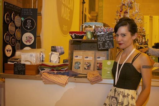 Kimberly Scola, designer and owner of Chez Sucre Chez, finds inspiration from traditional needlework and cross-stitch patterns. She was selling her embroidery kits, her monogrammed tea towels and her bowl covers.