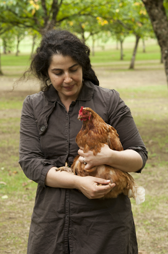 Nadia, who raises chickens, knew exactly how to handle this hen, who decided to stroll over and join our picnic.