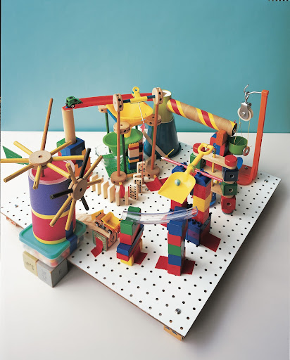 Marble Run: Many children enjoy tinkering with machines, taking things apart, and learning how stuff works, just for fun. This Peg-Board Marble Run embraces that curiosity; the clacking gumball machine runs without electricity, all with parts found in the kitchen and toy box.