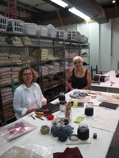 Maira and Natalie - Natalie uses Ball canning jars for drinking water and wraps a pincushion cozy around each jar.