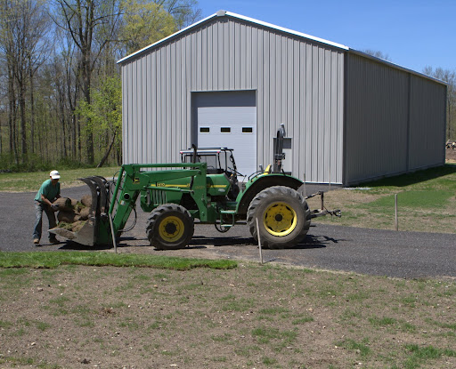 The area surrounding the new storage unit is in need of sprucing up and all that sod was laid down there.