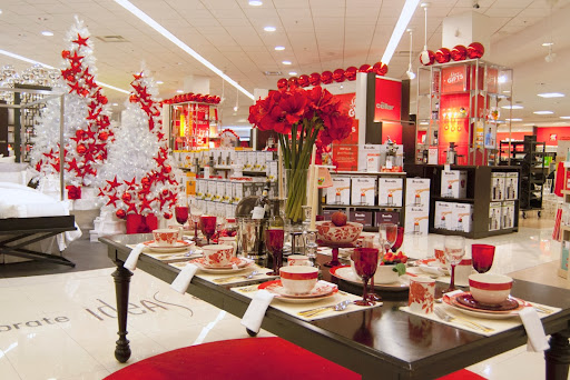 The store was decorated beautifully for the holidays. This dinner table is set with my Orleans Red Collection dinnerware, Classic Band Red dinnerware, and Red Glassware Collection - Perfect for the holidays!