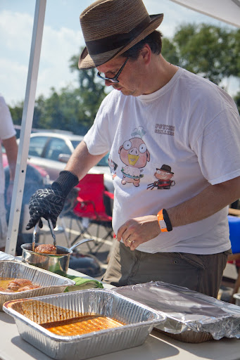 About 30 minutes before the chicken had finished cooking, Scott gave each chicken thigh a bath in their top-secret sauce.