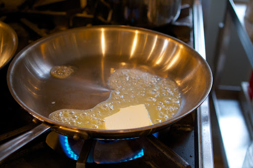 A little butter melted in a skillet