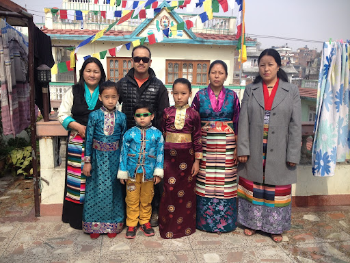 It was also great to see my in-laws and cousins. That's me in the black vest. My relatives are wearing traditional Sherpa clothing.