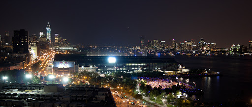 This is the view towards downtime with the under-construction Freedom Tower on the left and Jersey City, across the Hudson River on the right.
