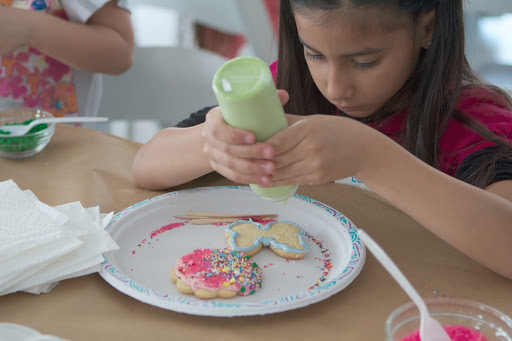 Isabel Tavares, daughter of Pete Tavares, was very creative, outlining her butterfly cookie with pastel blue icing and filling it with pastel green
