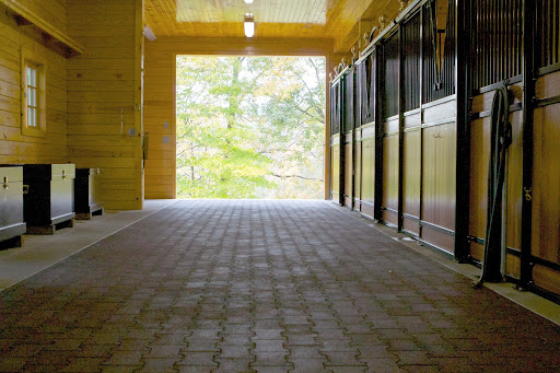 The stable has rubber cobblestone flooring and magnificent stalls.