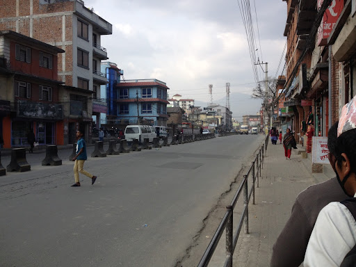 We decided to have our family reunion at the annual picnic held in Kathmandu. This is a random shot of a street lined with shops in the town.