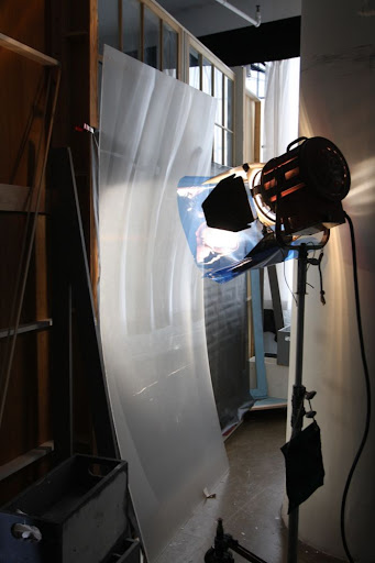 To help make the false windows, which were also covered with a scrim, look real, a light was placed behind to create 'sunlight.'