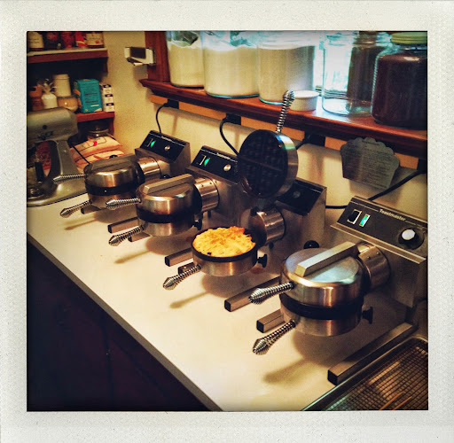 The Sunday breakfast waffles being cooked in the fabulous Belgian waffle irons - This is mass production!