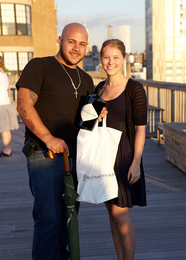 Daniel Mateo, with his prize package, and Anna Ross