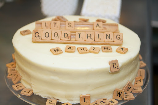 Andie and Jason Moore, owners of Andie's Specialty Sweets heard that I love Scrabble, so they created these truly inventive candy Scrabble chips and displayed them on this cake at the Wedding party.
http://www.etsy.com/shop/andiespecialtysweets