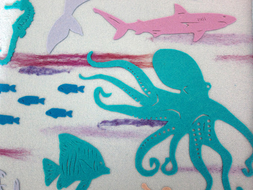 The screw punch was used for the Octopus, as well. All the other details were cut with a craft knife and a pair of really sharp scissors.