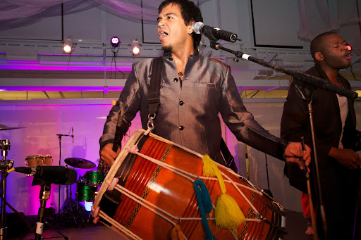 A dhol is a unique sounding double-sided barrel shaped North Indian drum that gets slung over one shoulder when played.