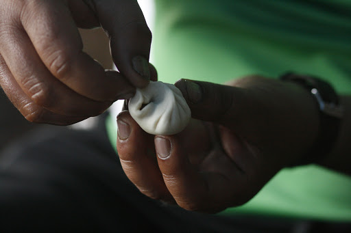 This is a photo from Vikas's upcoming Himalaya cookbook of shaping momo's (Tibetan style dumplings). All photos by Vikas. When I lived and volunteered in Dharamsala, North India in 2005, I used to eat momos regularly.