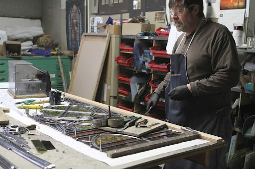 This is Brian, who has worked at Rohlf's for more than 30 years. He is a historian of stained glass.