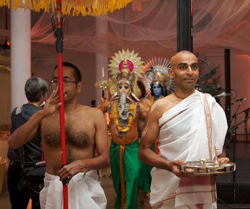 Opening ceremonies - leading of the celestial beings into the arena by the priest and umbrella bearer - The priest was played by Kavi Patel and the umbrella bearer, Ajay Balakrishnan.