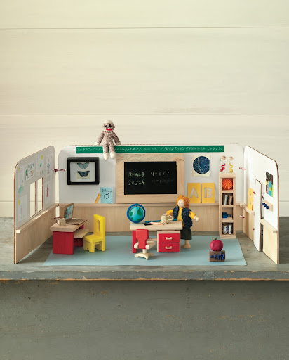 Cardboard Schoolhouse: This cardboard schoolhouse is easily constructed and folds away for easy storage.