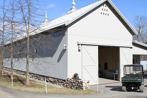 This is the equipment barn, which I had built soon after purchasing the farm. There are two large sliding doors at either end for accessing the equipment.