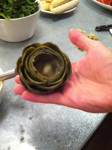 Pierre’s presentation for everything is amazing. He used a spoon to clean out the choke - the fine fuzzy stuff inside the artichoke - to create a cup for the Hollandaise sauce. I used kitchen shears to cut off the spiky tips of the leaves.