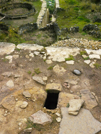 You can see the main entrance in the background and in the foreground a sacrificial site. The fortress contained more than 450 round stone houses.