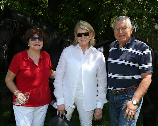 Posing with Paumanok Vineyards Ursula and Charles Massoud. Their winery is a renovated turn-of-the-century barn that houses a fermentation tank room and lab. Photo credit: Peter Marney