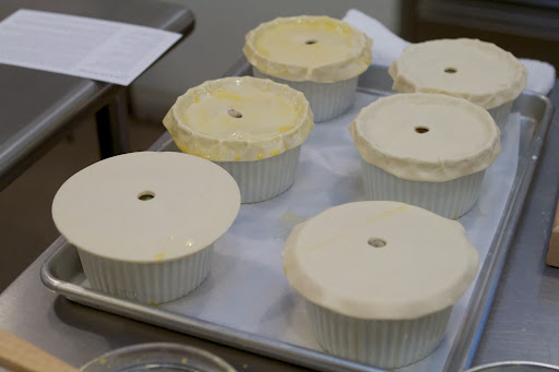 Pot pies at various stages of completion - Almost ready for the oven! The tops are also brushed with egg wash to give great shine and color.