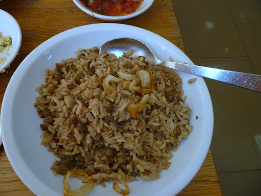 Majadera - a staple of Middle Eastern cuisine - made with rice, lentils, fried onions, and Middle Eastern spices