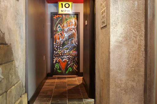 There's even graffiti art on the restroom door.