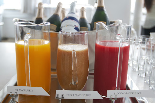 DIY Mimosa Bar: Freshly squeezed juice for breakfast mimosas. Guests chose their own combination and even combined juices