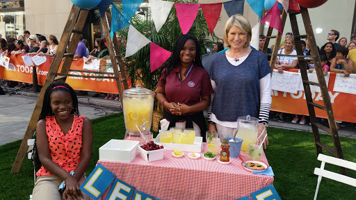 Terri and Neisha Ferguson - sisters from Mississippi were chosen from the audience to help run the lemonade stand.