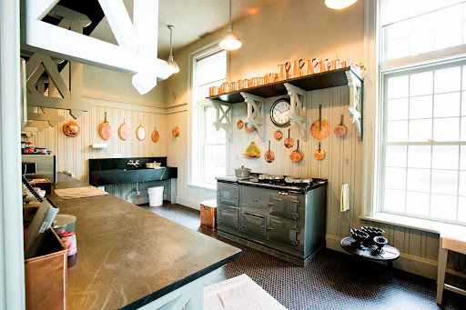 This is the stable kitchen, where much of my copper cookware is on display. The kitchen has a soapstone counter top and a soapstone sink.
