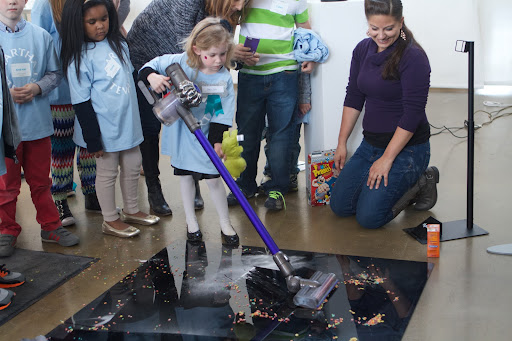 Dyson brought their lightweight, cordless vacuum and held demonstrations to show that even small children can handle it with ease.