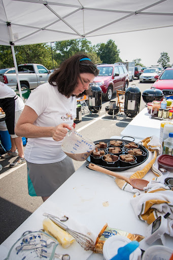 After the banana bread pieces were placed in ramekins, Lynn poured in the chocolate custard she prepared.