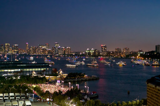 The parks along the Hudson River were packed with spectators. That's Jersey City, New Jersey across the river - my birthplace.