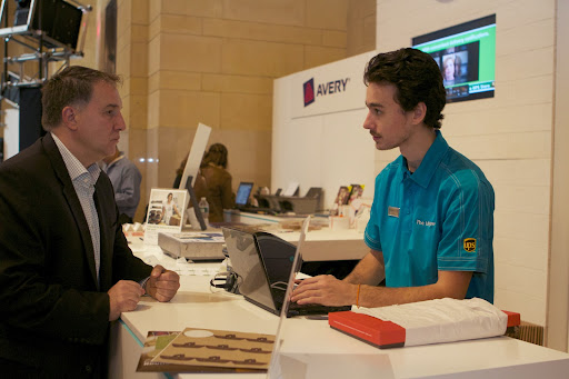 The UPS store graciously offered free shipping to all American Made attendees! Sidney Huber, the UPS Store Sales Associate, is seen here arranging the shipment of this customer's package.